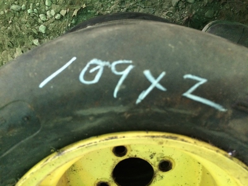 lot 109 image: John Deer Carlyle Rear Steer Tires on rims  20 x 10.00 -10  lot of 2