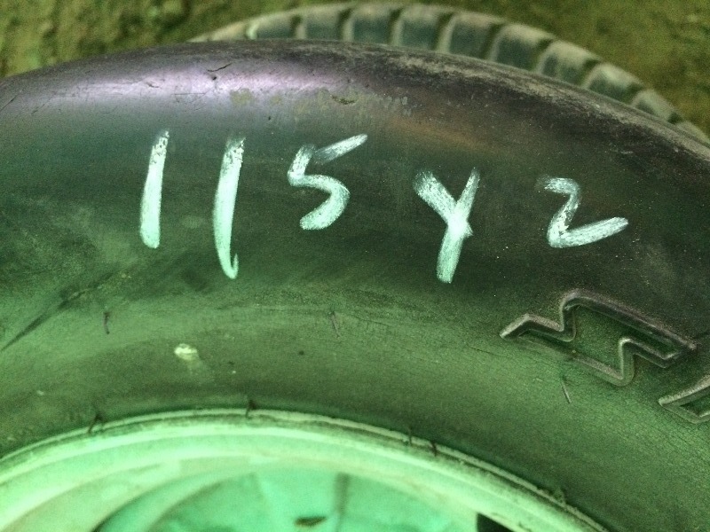 lot 115 image: Toro Riding Lawn Mower Tires  Rear 24 x 13.00 - 12  Front 20 x 10.00 - 10  lot of 2