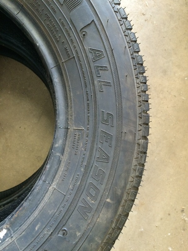 lot 195 image: All Season Tires P205 70R15   lot of 2