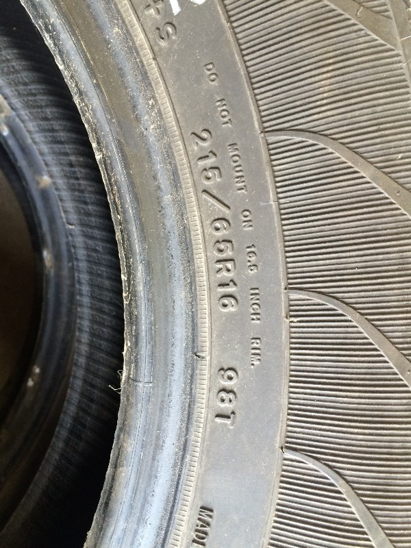 lot 208 image: Goodyear Tires 215 65R 16    lot of 2