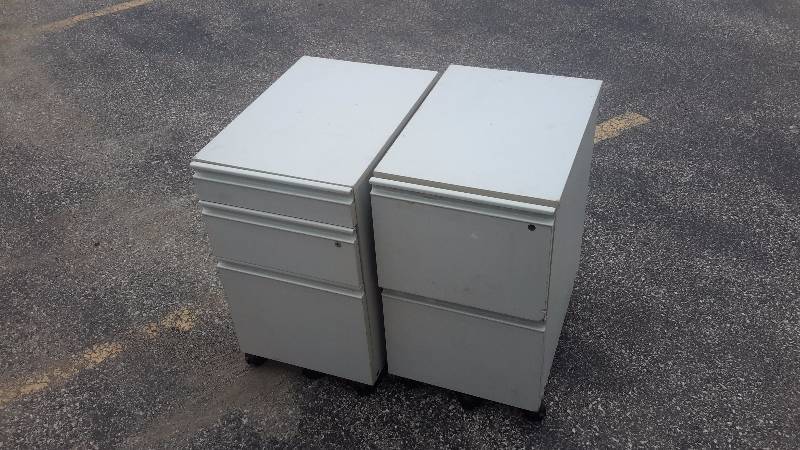 lot 29 image: Pair of file boxes with multiple drawers and Rolling Wheels