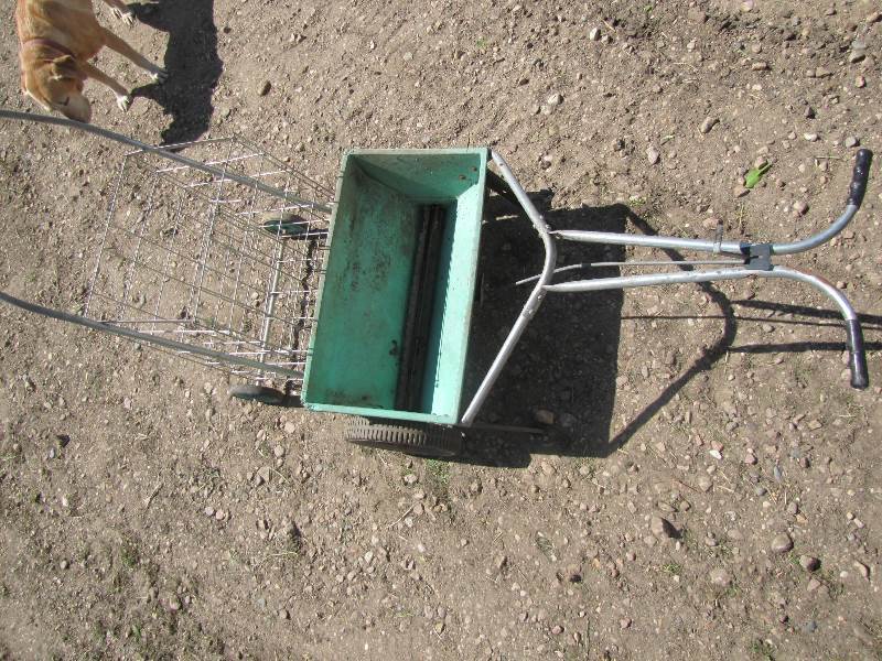 lot 7 image: Grass Seeder & Grocery Cart