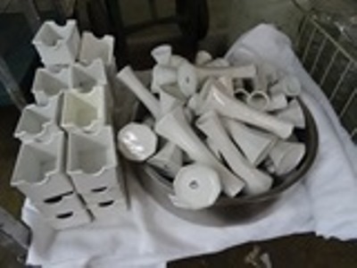 lot 212 image: Vases & Sugar Packet Holders