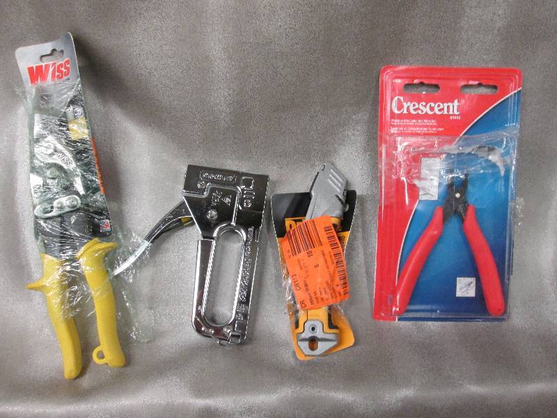 lot 99 image: Wiss Aviator Snips, Stanley stapler...