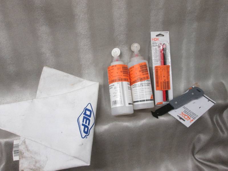 lot 131 image: Grout bag, 2 sealer bottles with ap...