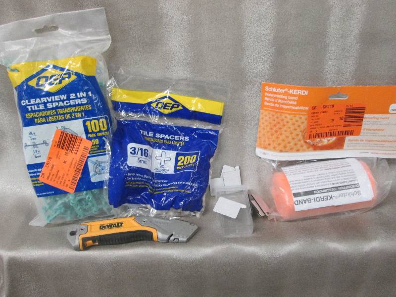 lot 132 image: Lot of 2 bags tile spacers, Retract...