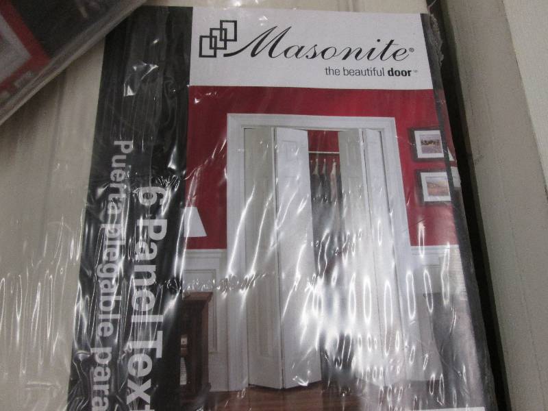 lot 163 image: Masonite 30 in x 80 in bifold close...