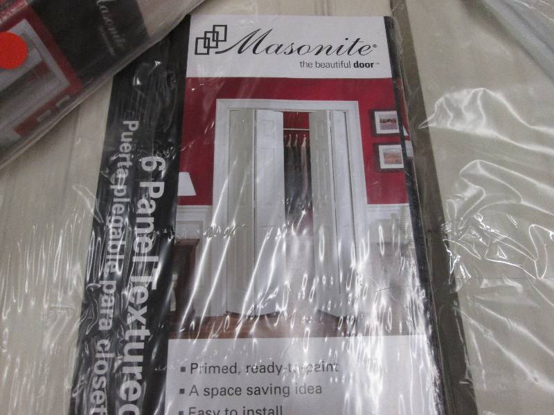 lot 164 image: Masonite 30 in x 80 in bifold close...