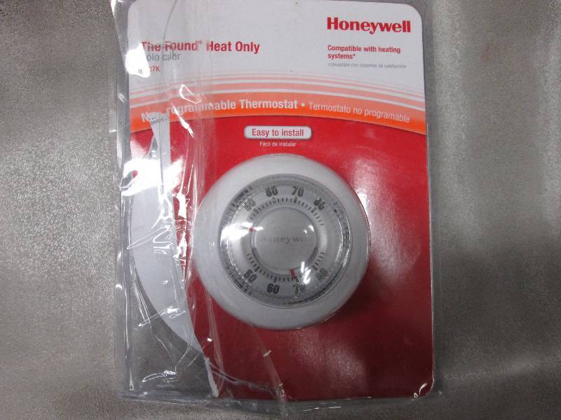 lot 313 image: Honeywell Round Mechanical Thermost...