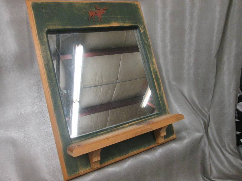 lot 327 image: Moose themed mirror with shelf...