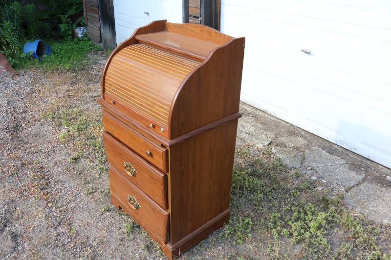 Wood dresser with roll up top