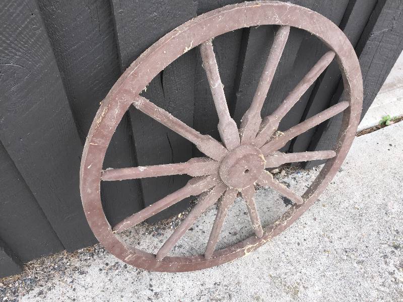 lot 38 image: Wooden wagon wheel