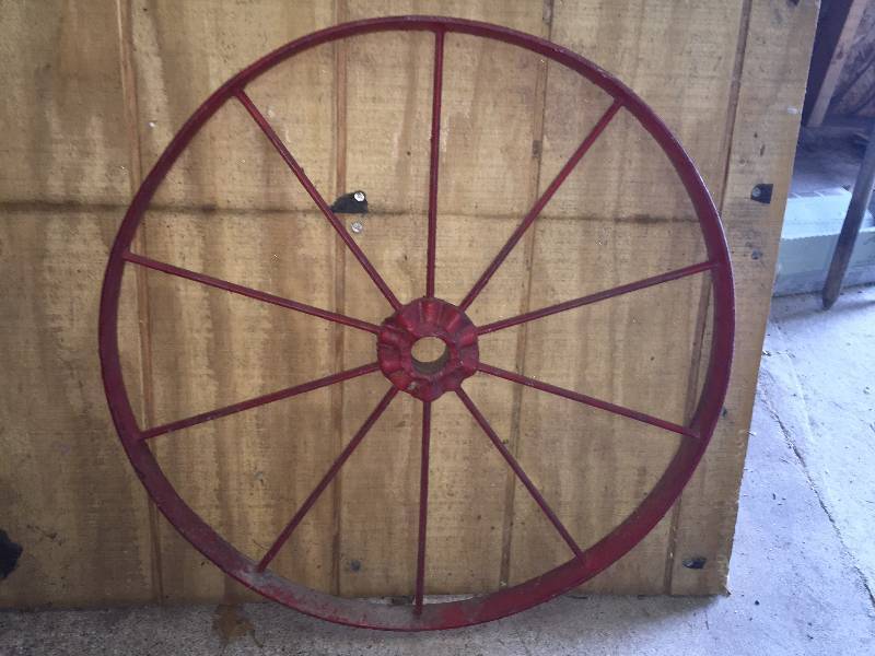 lot 33 image: Lot of 4 wagon wheels.