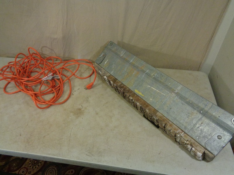 lot 79 image: Folding Sawhorse and Extension Cord