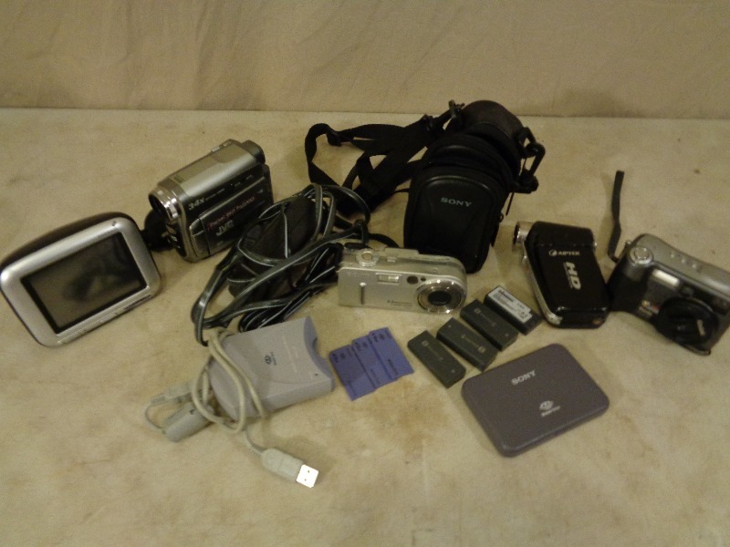 lot 170 image: Tom Tom, Video Cameras, Digital Cameras, and More