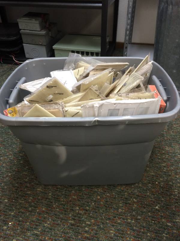 Tote Full of Outlet And Switch Covers