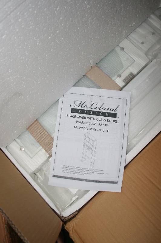 Glass front bathroom space saver