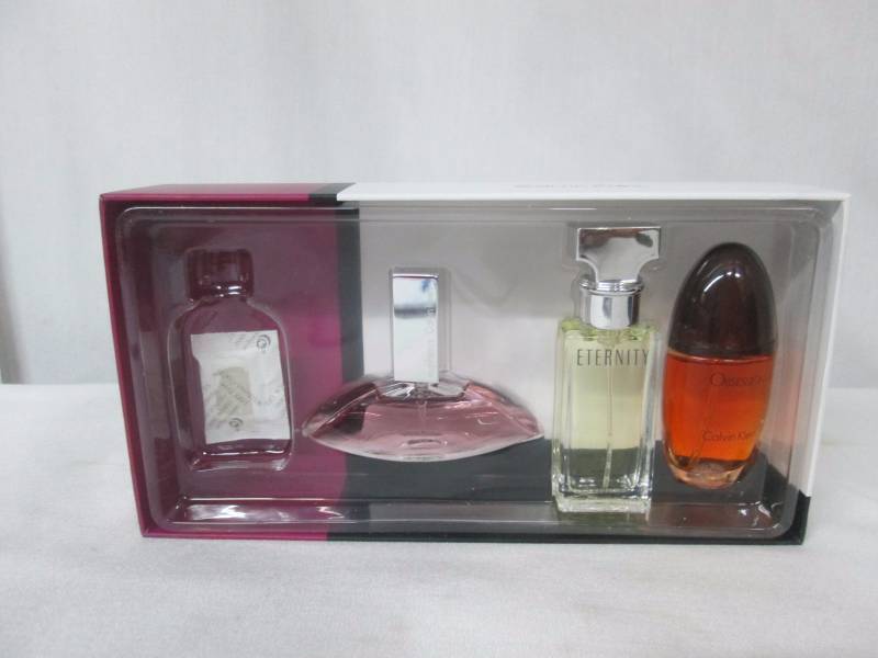 lot 68 image: Calvin Klein 3-pc. Mini Coffret