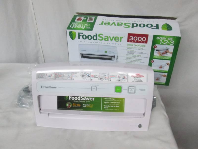 lot 28 image: FoodSaver Vertical Design Vacuum Sealing System