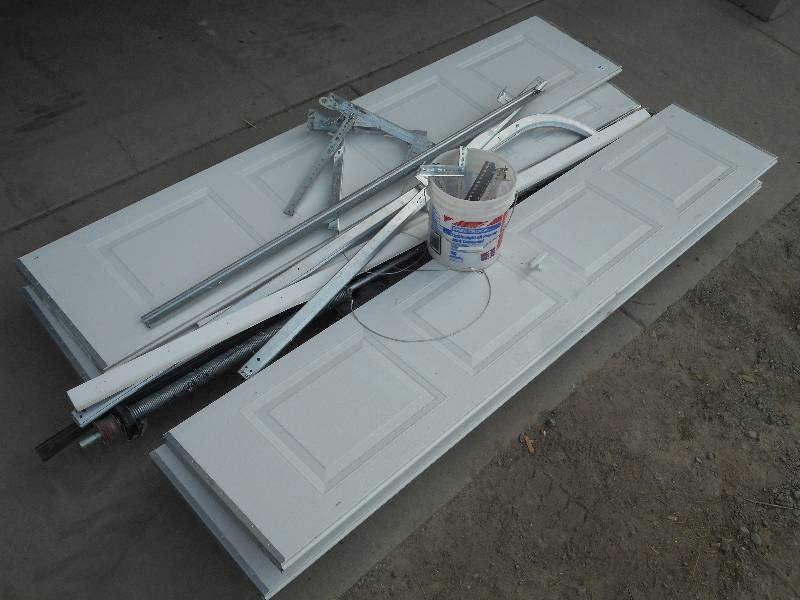 White Raised Panel 9Wx7H Un-Insulated Aluminum Garage Door