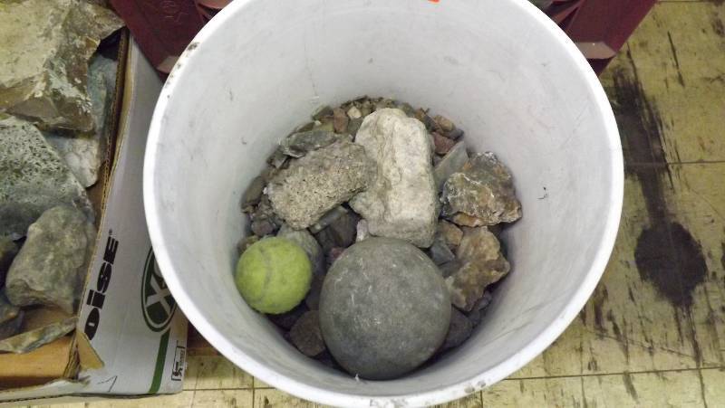 lot 41 image: Bucket with misc rock