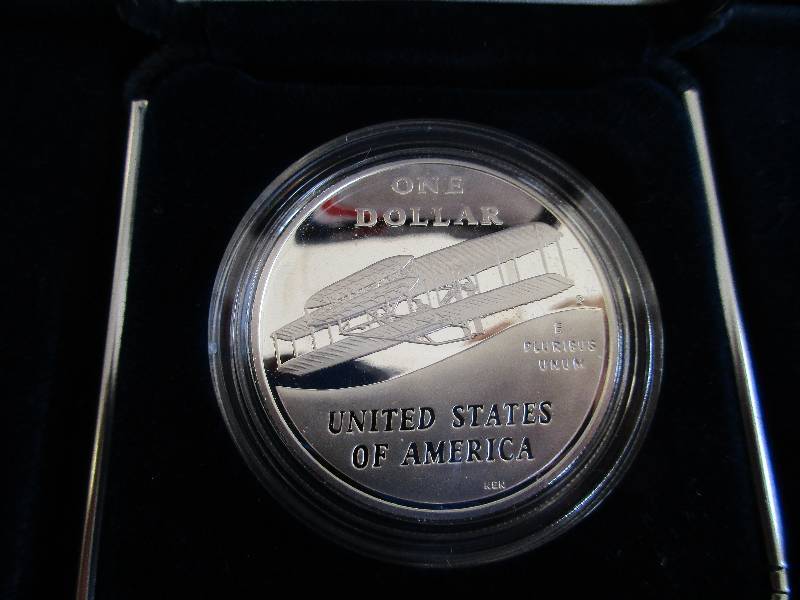 2003-P (Philadelphia Mint) First Flight Centennial Commemorative Proof Silver Dollar with original US Mint Box and Certificate of Authenticity.