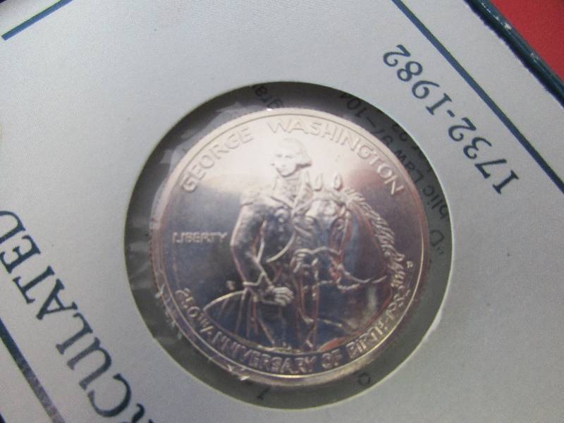 1982-P George Washington Commemorative Silver Half Dollar with original US Mint box and Certificate of Authenticity.