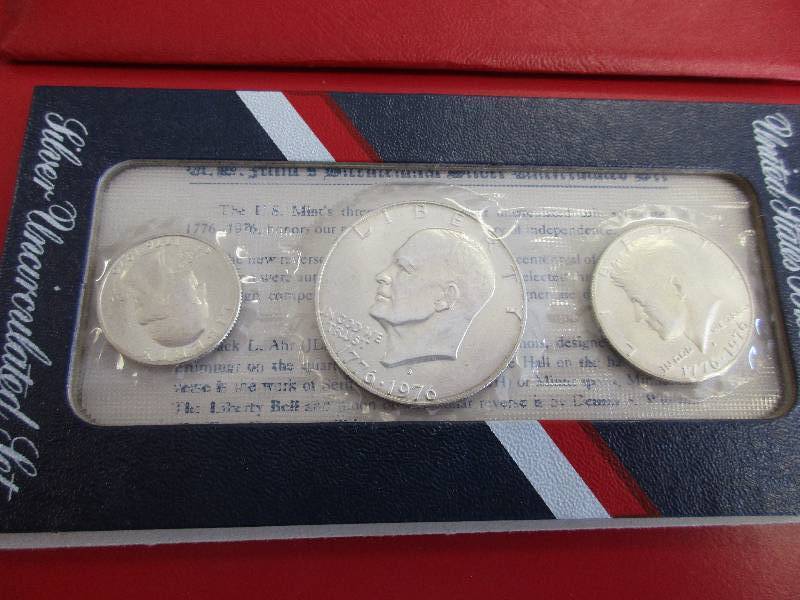 1776-1976-S US Mint Bicentennial Silver Uncirculated set of three silver coins (Eisenhower Silver Dollar, Silver Kennedy Half Dollar and Silver Washington Bicentennial Quarter. Historical Silver coin set. Also known as the Red Pack
