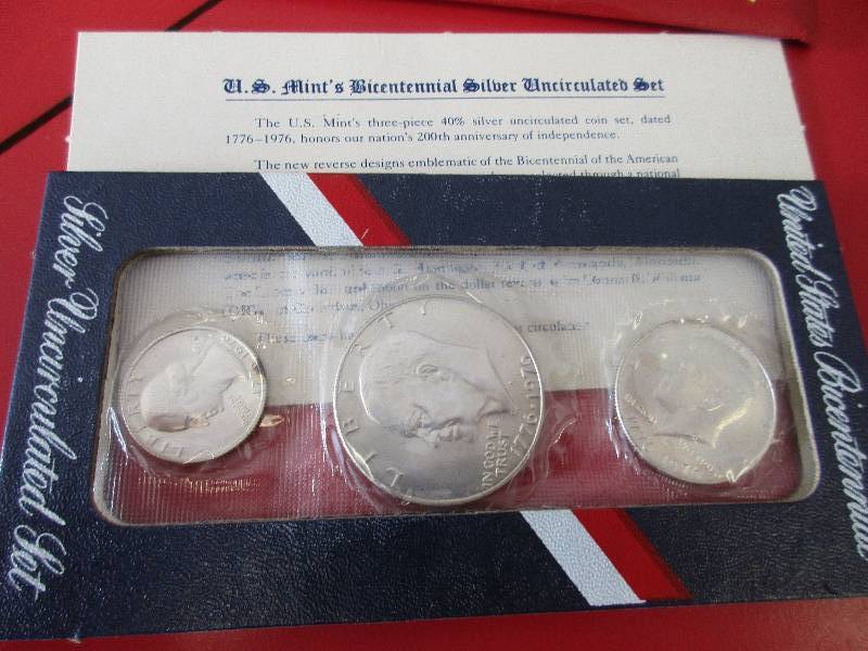 1776-1976-S US Mint Bicentennial Silver Uncirculated set of three silver coins (Eisenhower Silver Dollar, Silver Kennedy Half Dollar and Silver Washington Bicentennial Quarter. Historical Silver coin set. Also known as the Red Pack