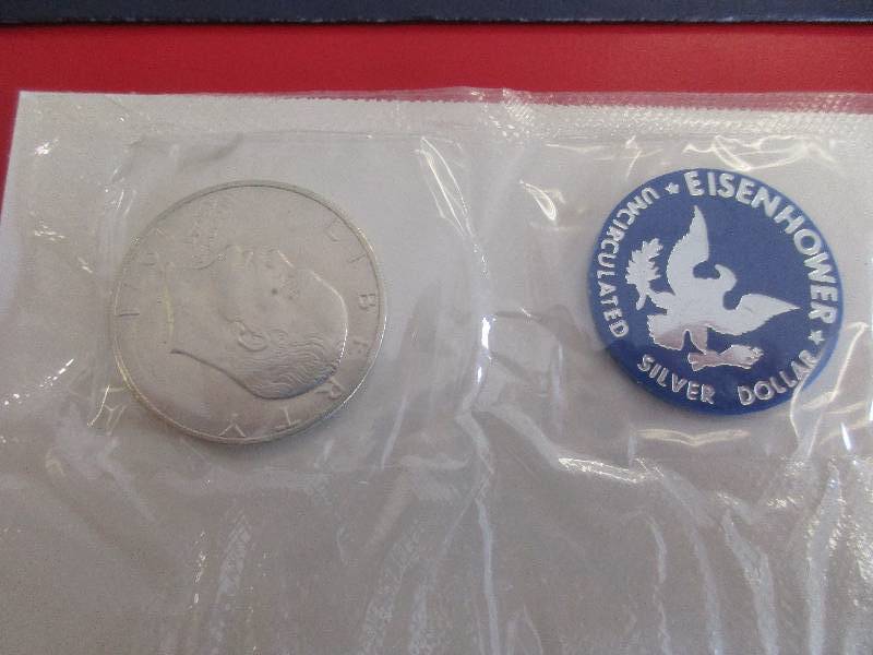 1971-S Eisenhower 40% Silver Dollar.  Known as the Blue Ike or Blue Pack Ike. The 1971-S is rare in higher mint state grades, as NGC has not certified a MS 69 or 70 and has only certified 13 MS 68s.