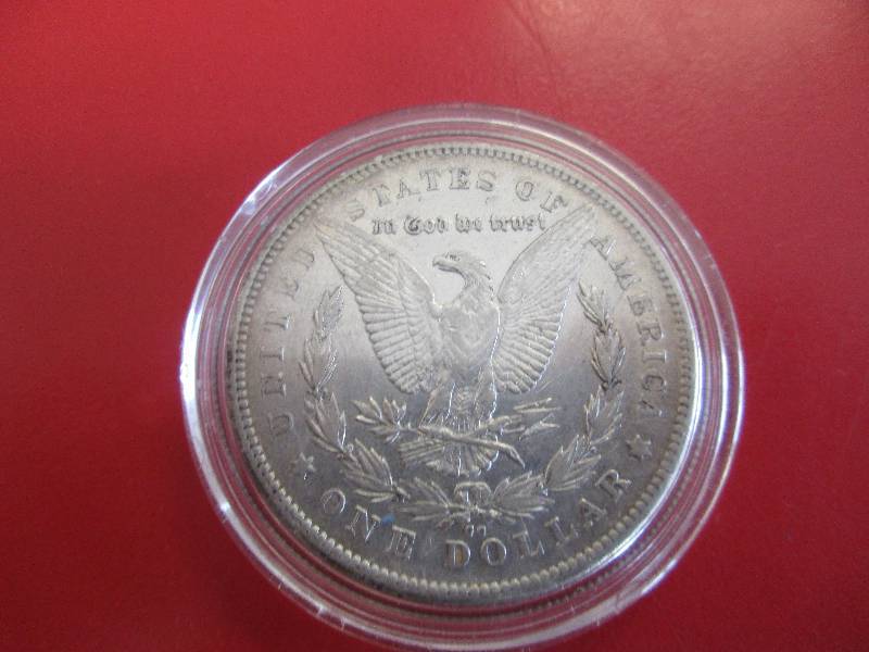 1878-CC (Carson City Mint) Morgan Silver Dollar in what is believed to be in AUBU condition.  Not a grader but nice coin. Carson City minted less than 6% of all Morgans and are more rare than other MSDs