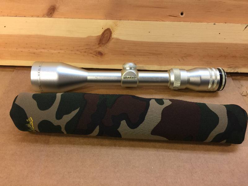 lot 36 image: Simmons 3x10 Silver scope with cover
