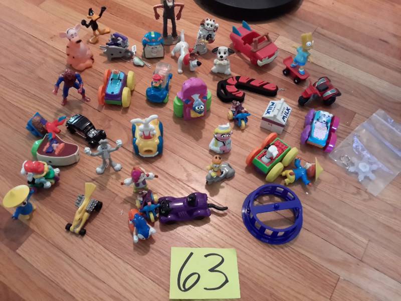 lot 63 image: Small Plastic Toys as shown
