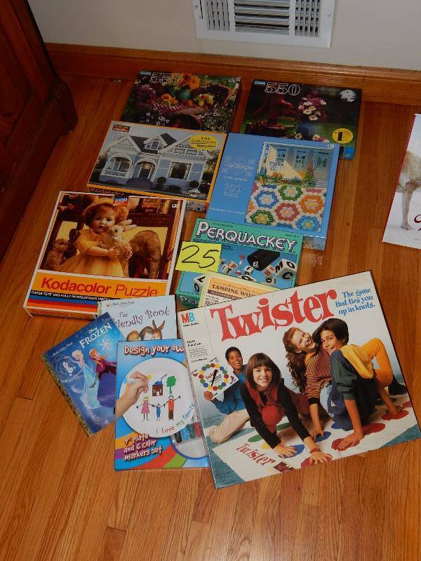 lot 25 image: Misc. Games and Puzzels (puzzels are new.. SEALED)