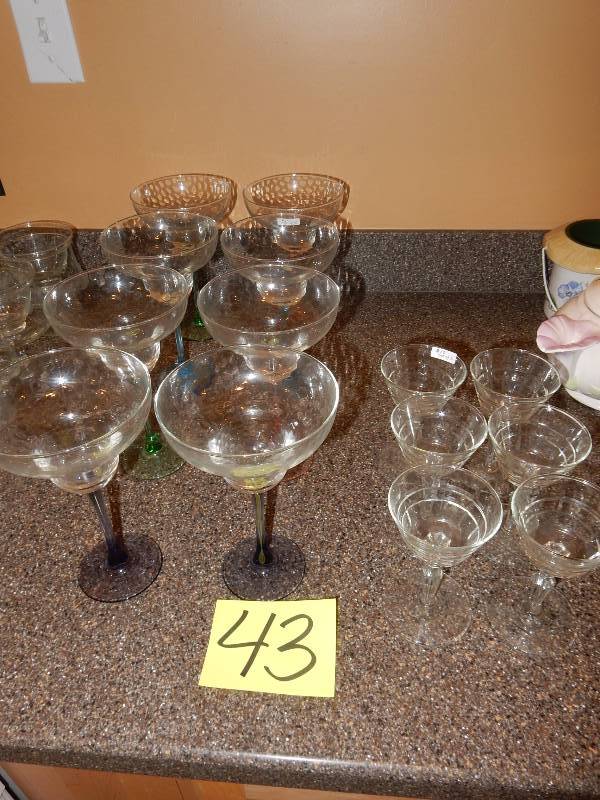 lot 43 image: 8 Tall Sherbets with colored stem.  4 12 in diam x 7 12 in h, 6 smaller crystal stemmed glasses