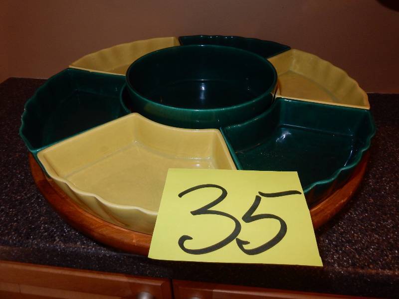 lot 35 image: Mid mod style serving traylazy susan.. Wood base, ceramic containers