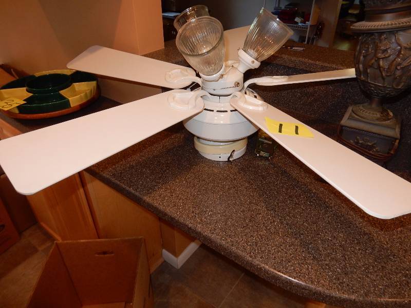 lot 11 image: 5 blade, 44in diameter, ceiling fan with light.. Untested as it was taken down.  Owner says it works fine