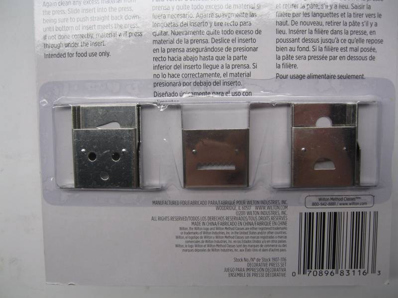 lot 1112 image: Wilton cake decorating press set wi...