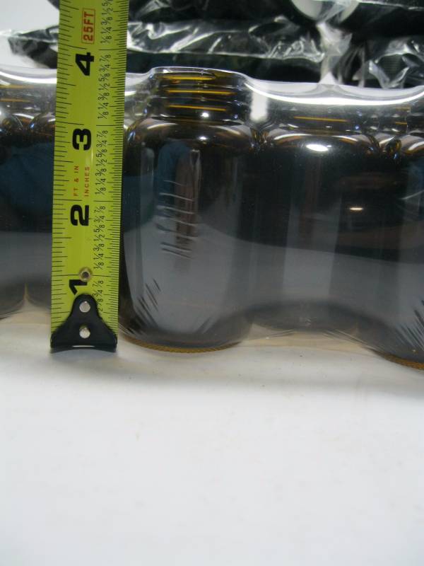 lot 1539 image: Case of 60 - 4 Oz Brown Glass Bottl...