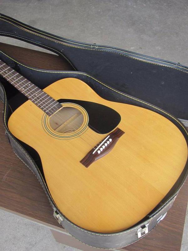 lot 58 image: Yamaha F-310 Acoustic Guitar with Case