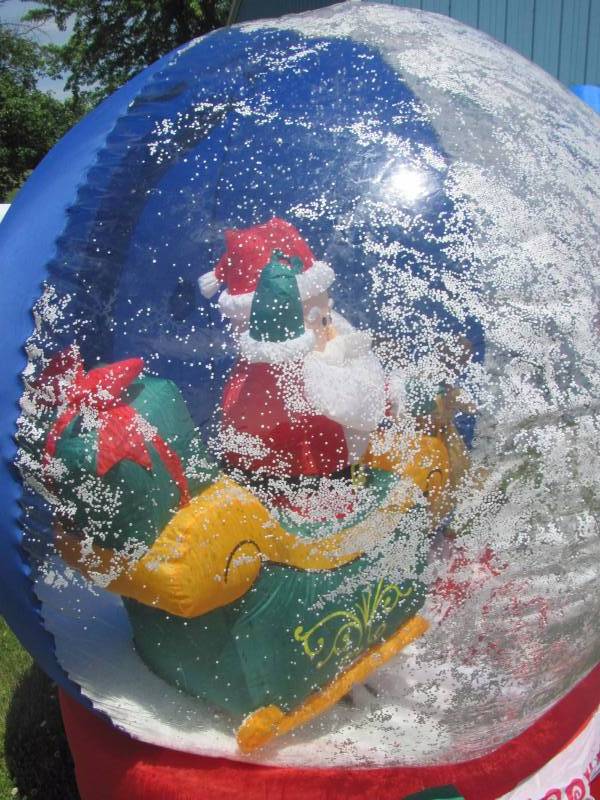 lot 214 image: 6 Santa Claus Snow Globe Inflatable Lightup Christmas Yard Ornament