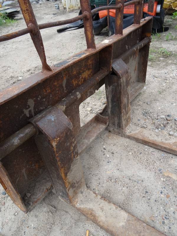 Skid loader pallet forks.