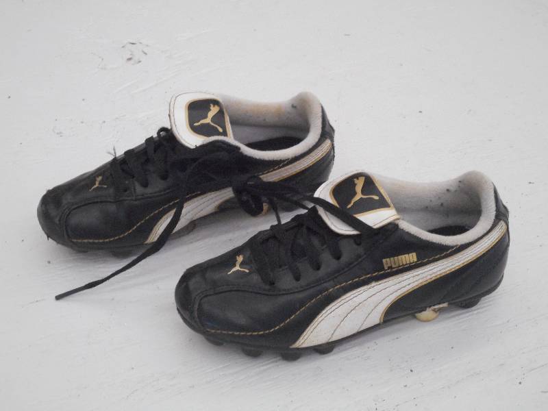 lot 94 image: Puma BlackWhite Soccer Shoes, Size...