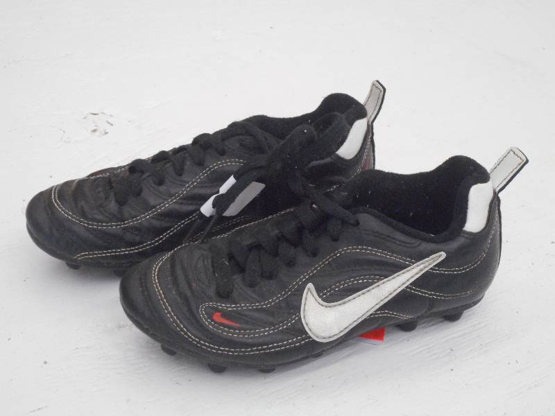 lot 104 image: Nike BlackWhite Soccer Shoes, Size...