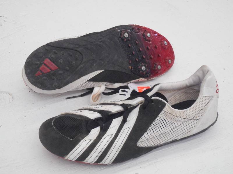 lot 118 image: Adidas BlackWhite TrackRunning Sh...