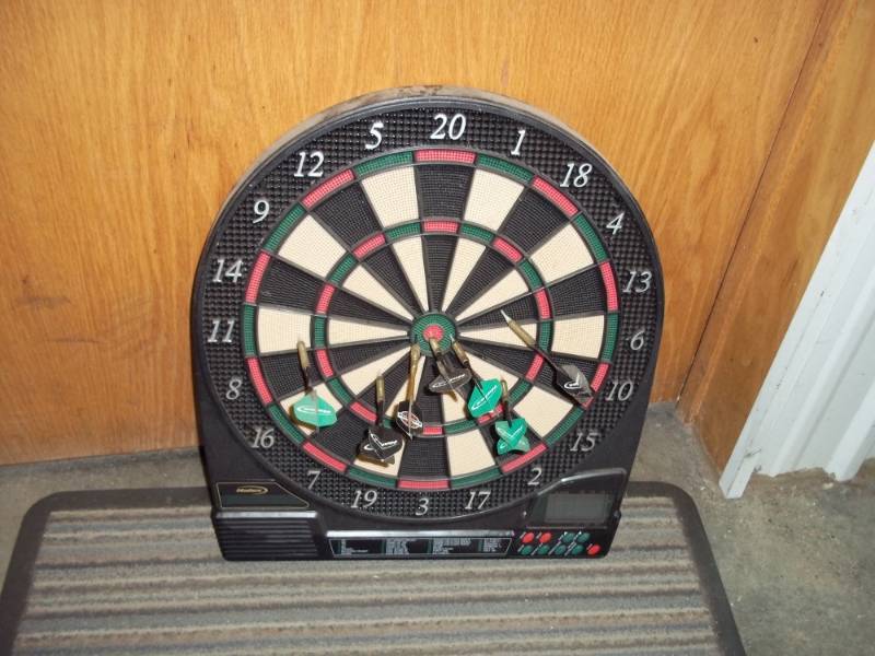 lot 97 image: Electronic dart board with darts