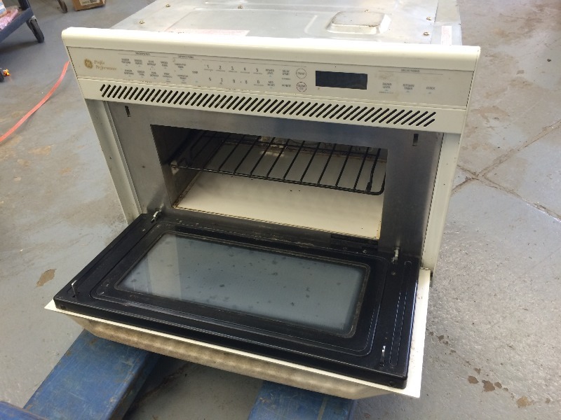 GE Oven - works  115  volts  insert measures 25 wide x 13 deep x 25 high  (add 78 flange all sides to measurement)