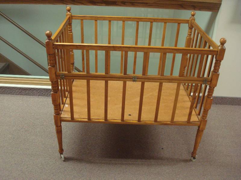 lot 9 image: Vintage Folding Wood Baby Crib, Some Wear