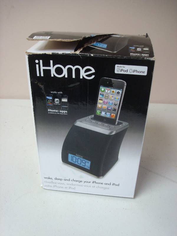 lot 57 image: iHome Ipod Radio Clock Dock, Opened, But Looks Unused