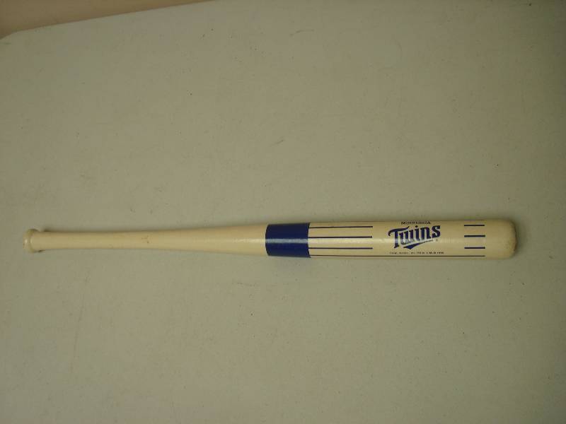 lot 68 image: White Small Minnesota Baseball Bat, Some Wear